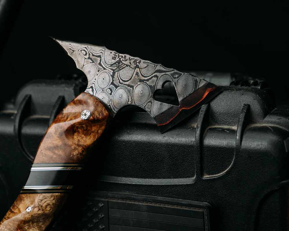 Mini Bleeding Heart Hawk- Baker Forge GoMai CuShim (DamCore) Raindrop- Chechen Caribbean Rosewood, Black G10, OD Green G10 and Brass Pin Striping, Bison Horn Split, Mosaic Pins, Textured Grip