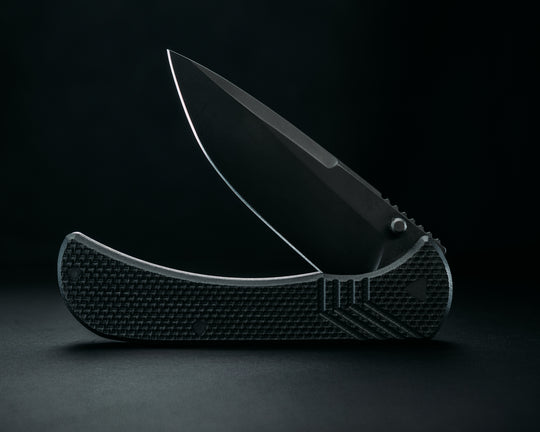 Cav Folder - Black G10, Armor black Cerakote Blade, Textured Grip, TI Frame.