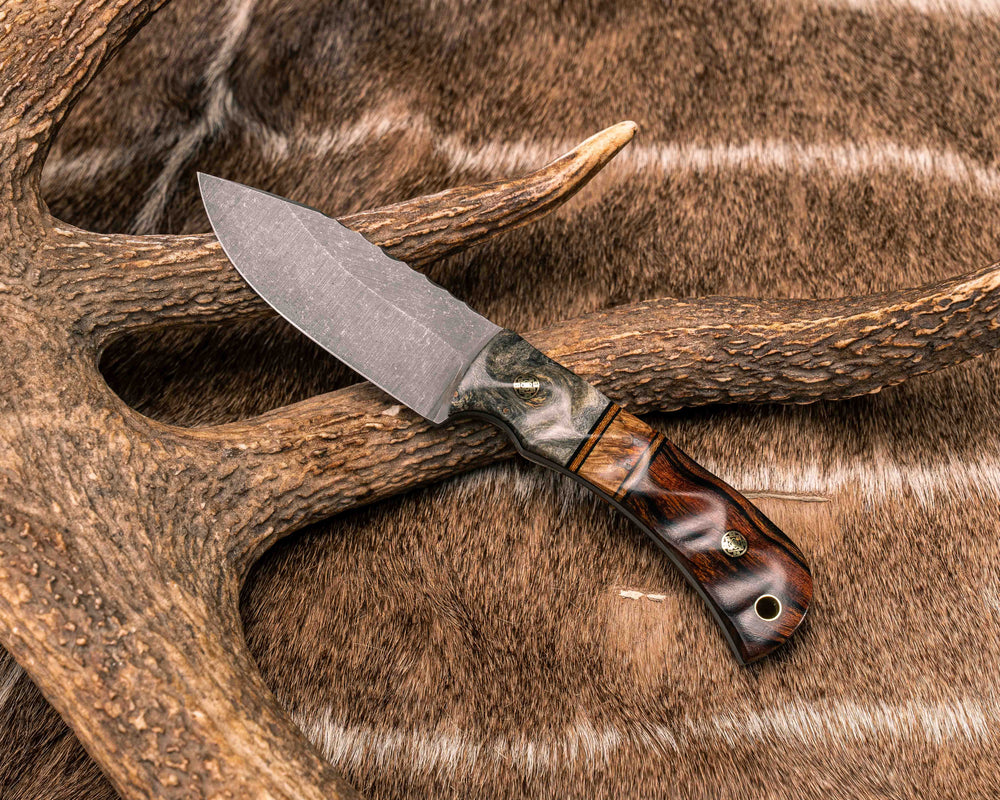 Modified Cav Jr- Buckeye Burl, Black G10 and Natural Canvas Micarta Pin Striping, Lion's Blood Amboyna Split, Desert Ironwood, Brass Mosaic Pins, Brass Lanyard Pin, Textured Grip