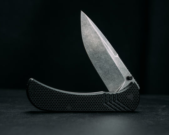 Cav Folder - Black G10, Textured Grip, TI Frame.