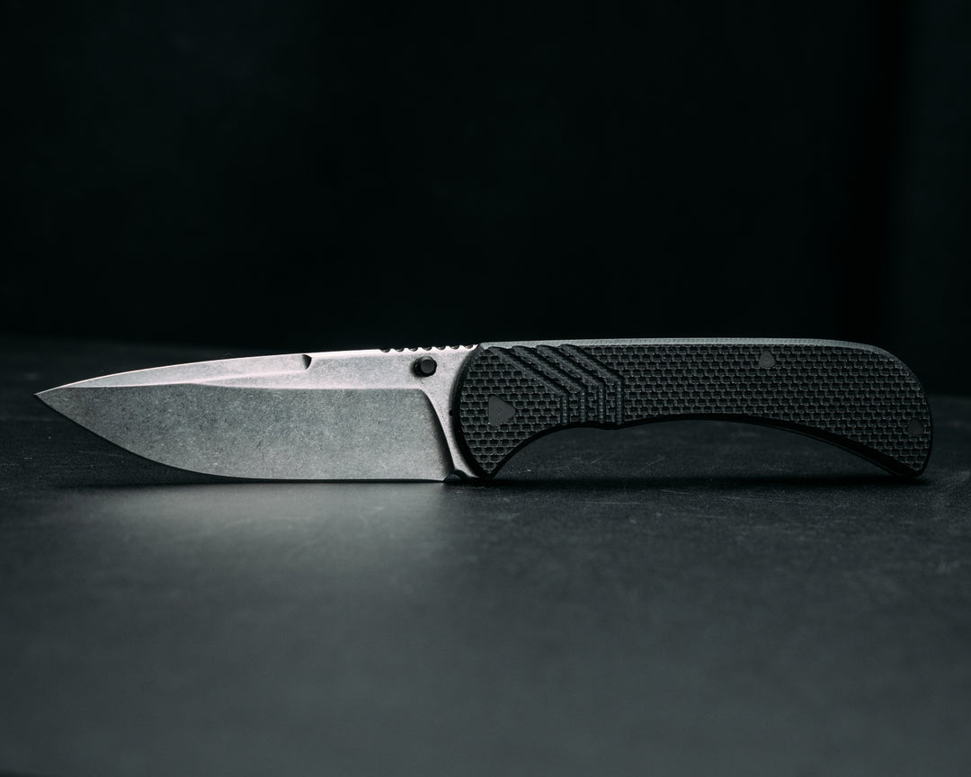 Cav Folder - Black G10, Textured Grip, TI Frame.