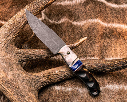 Crow Jr- Elk Antler, Black G10, White G10 and Copper Pin Striping, Sodalite Tru-stone and Brown Canvas Micarta Split, Desert Ironwood, Mosaic Pins, Copper Lanyard Pin, Textured Grip