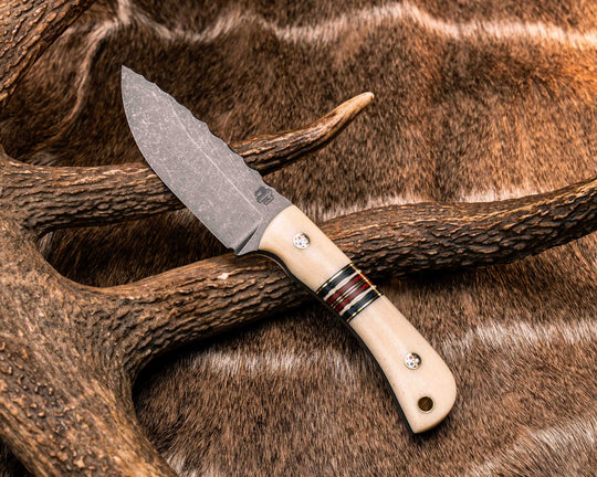 Cav Jr- Giraffe Bone, Black G10, Brass, Navy Canvas Micarta, White G10, Red Canvas Micarta Split, Patriot Mosaic Pins, Brass Lanyard Pin, Smooth Grip