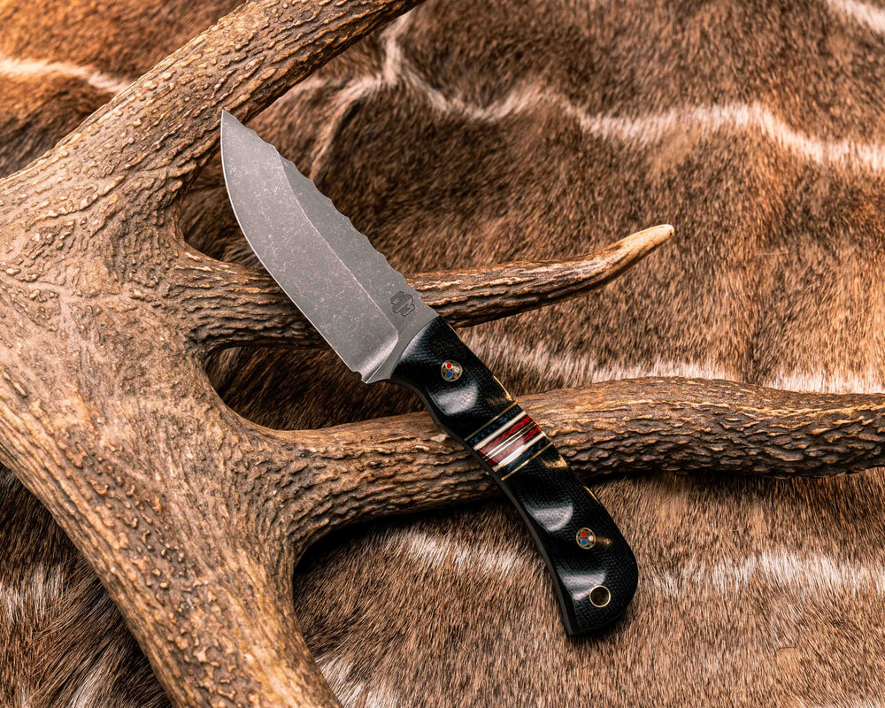 Cav Jr- Black Canvas Micarta, Black G10, Brass, Navy Canvas Micarta, White G10, Red Canvas Micarta Split, Patriot Mosaic Pins, Brass Lanyard Pin, Textured Grip