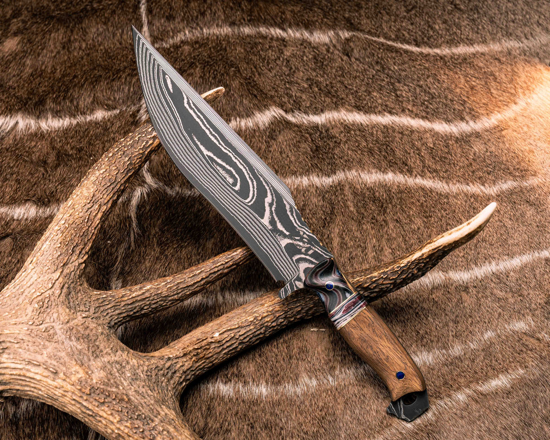 American Bowie- Sherman Tank Damascus SanMai- Geronimo Lapis Azuli Stone Inlay from Abbottabad Pakistan, WWI,WWII, Vietnam & Modern SEAL Cammie Micarta, American Flag Split, White Oak from the U.S.S. Constitution, Lapis in Brass Pins, Textured Grip