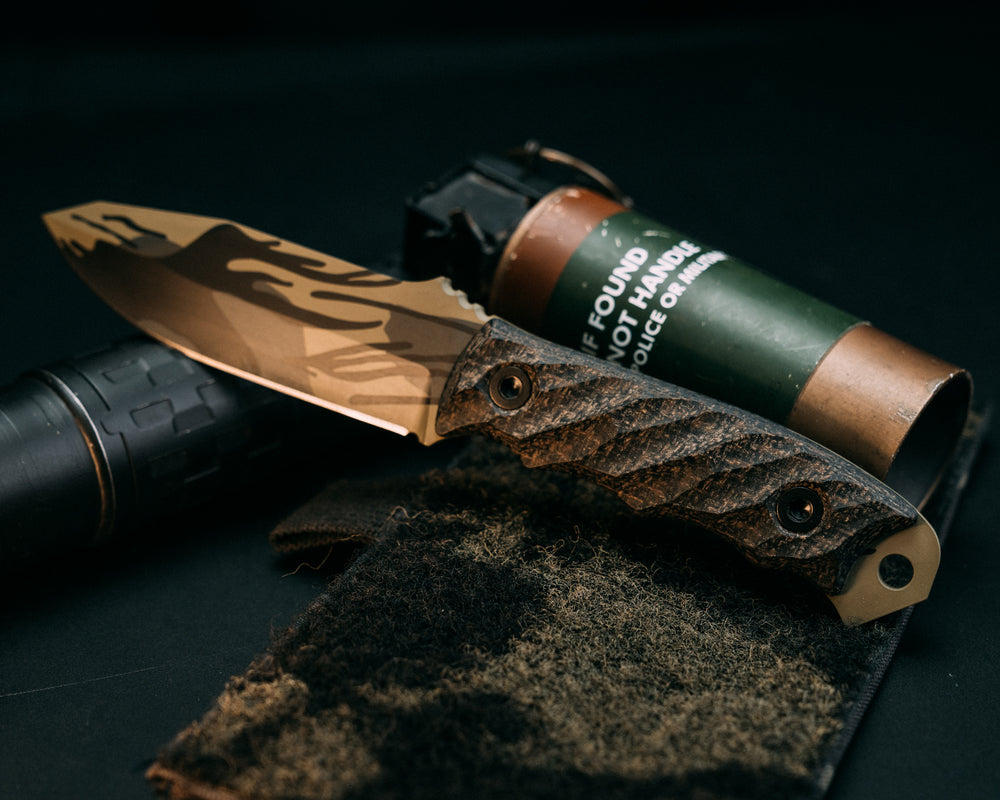 Disaster Jr -  Black & OD Green Burlap Micarta, Black Rhodesian Cerakote, Allen Bolts, Iron Grip.