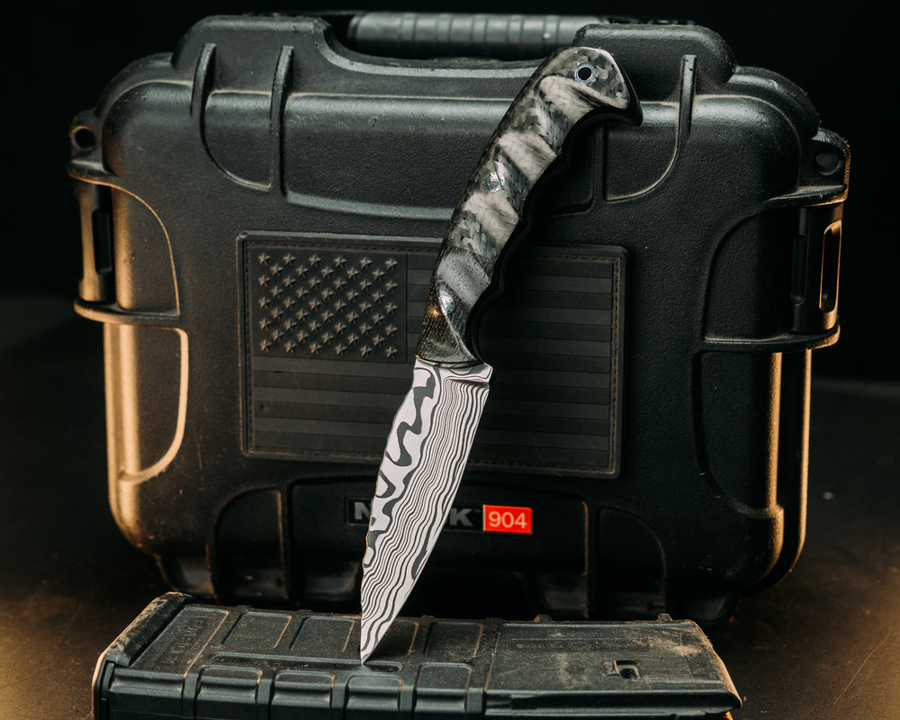 4" Humint- Baker Forge Stainless Steel Wavy Damascus- African Blackwood, Carbon Fiber, Mosaic Pins, Aluminum Lanyard Pin, Textured Grip
