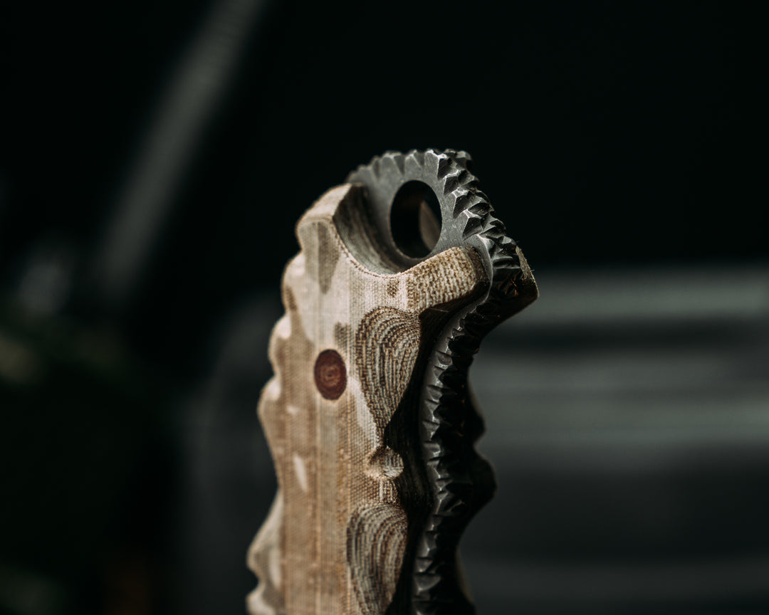 Notched Disaster Breacher- Desert Tiger Stripe Cammie Micarta, Brown Micarta Pins, Textured GripRock Worked Spine