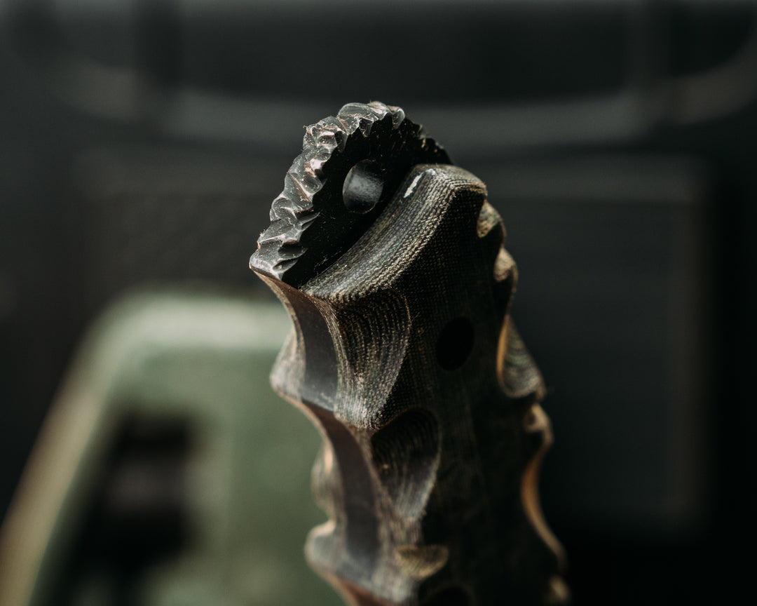 Notched Disaster Jr.- Digi Green and Brown Mil Spec Micarta, CF Pins, Textured Grip, Rock Worked Spine and Skull Crusher