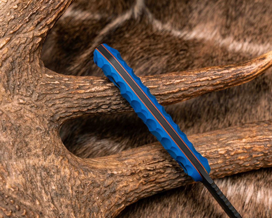 Feather Light- Blue G10, Orange and Purple G10 Liners, Armor Black Cerakote, Allen Bolts, Textured Grip