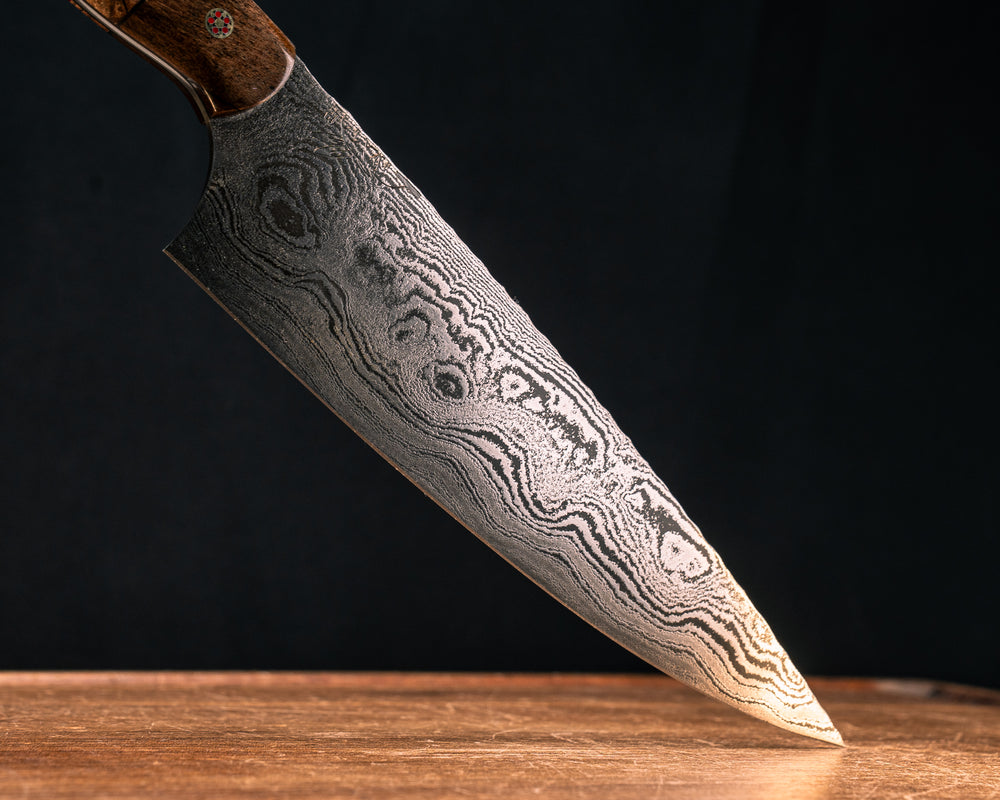 Chef Blade- Baker Forge Random Pattern Damascus- Dinosaur Bone, Black G10, OD Green G10, Desert Tan G10, Brass, Cherry G10 and Spalted Tamarind Split, Mosaic Pins, Smooth Grip