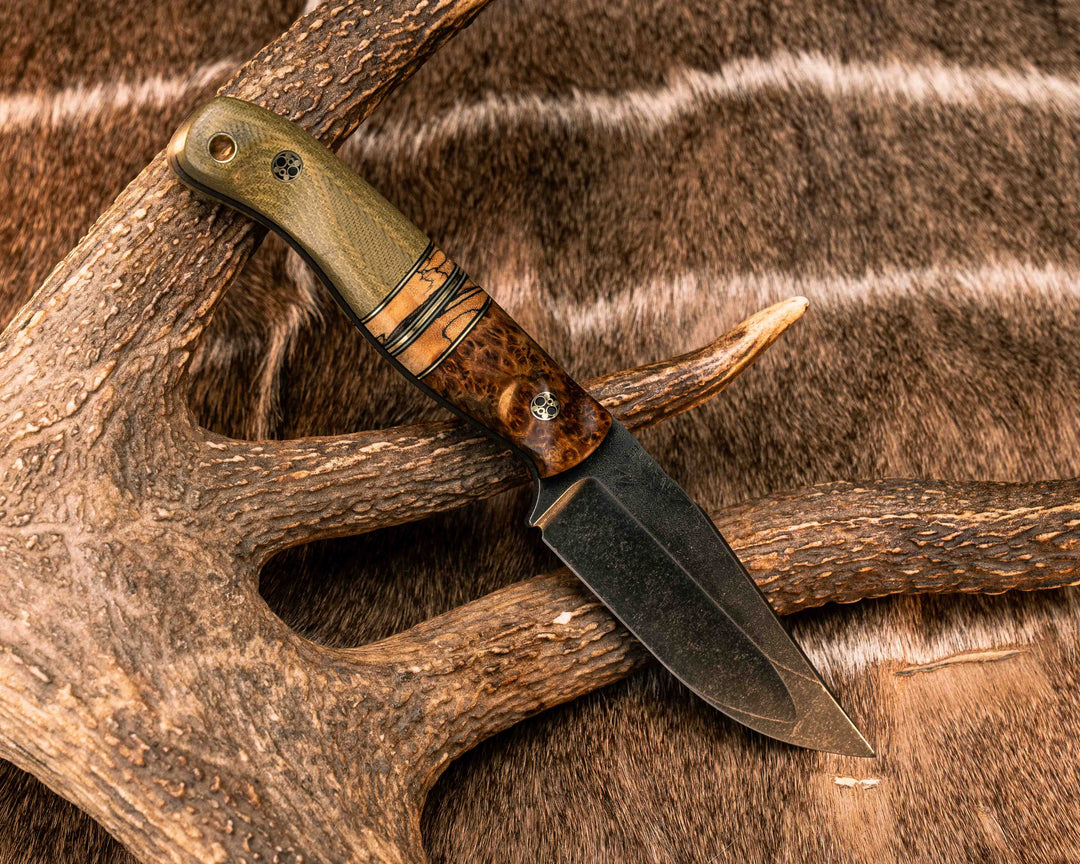 Crow Jr (Compound Grind)- Chechen Caribbean Rosewood, Black G10, Brass and Desert Tan G10 Pin Striping, Spalted Tamarind Split, Olive Green Canvas Micarta, Mosaic Pins, Brass Lanyard Pin, Textured Grip