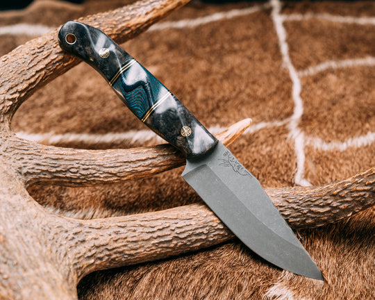Crow Jr- Dyed Black Ash Burl, Black G10 and Brass Pin Striping, Giraffe Bone Over Arctic Storm FAT Carbon Split, Mosaic Pins, Brass Lanyard Pin, Textured Grip