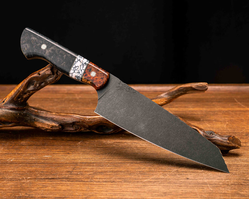 Santoku- Lion's Blood Amboyna, Black G10, Brass and Copper Pin Striping, White with Black Web Tru-stone Split, Dyed Redwood Burl, Mosaic Pins, Smooth Grip