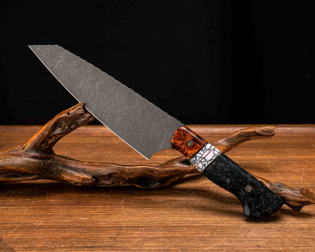 Santoku- Lion's Blood Amboyna, Black G10, Brass and Copper Pin Striping, White with Black Web Tru-stone Split, Dyed Redwood Burl, Mosaic Pins, Smooth Grip