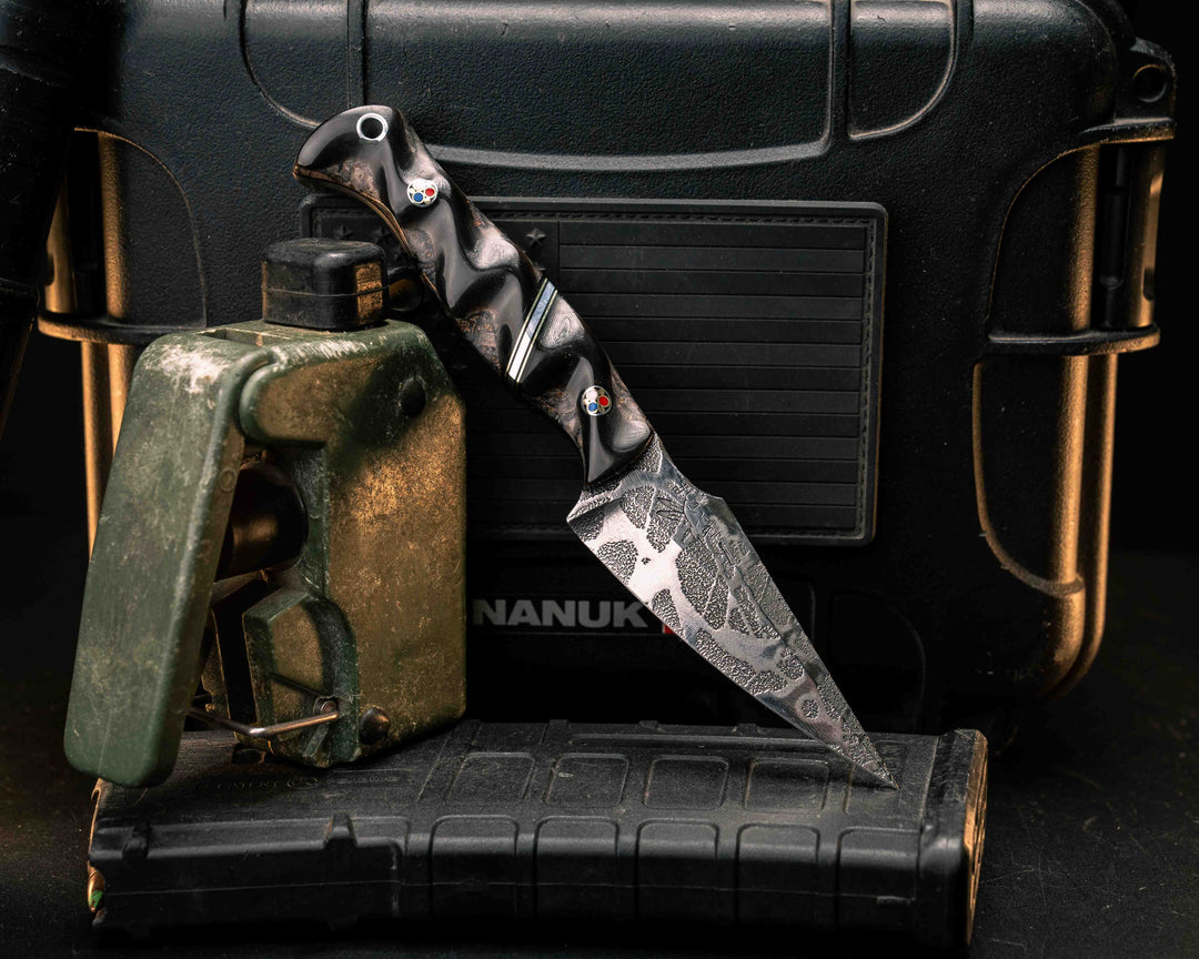 Gulo Gulo- Rams Horn Over Dyed Box Elder, Black G10, Brass and Aluminum Split, Patriot Mosaic Pins, Aluminum Lanyard Pin, Textured Grip