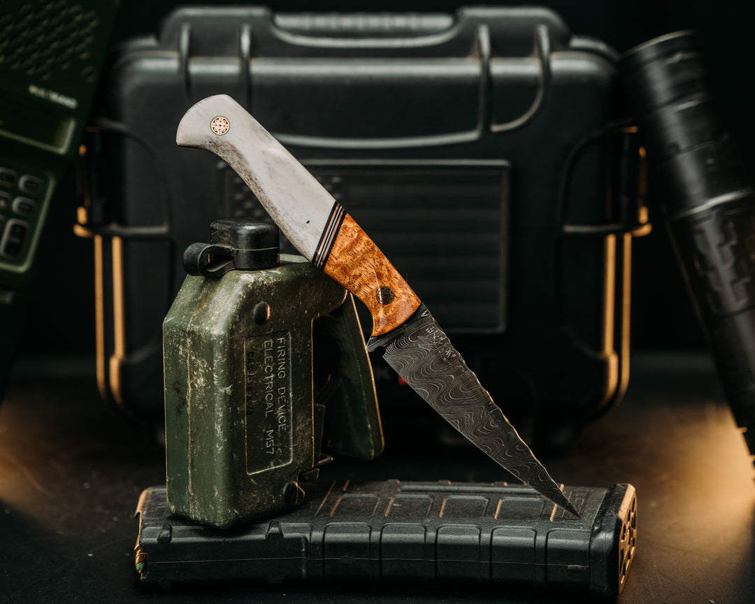 Congressman- Old Stock Wavy Pattern Damascus- Afzelia Burl, Black G10, Copper and White G10 Split, Elk Antler, Mosaic Pins, Textured Grip