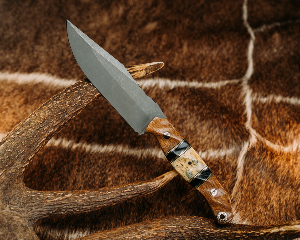 Crow Scout Drop Point - White Oak, Black G10 and Brass Pin Striping, Black Dark Matter Carbon and Dyed Giraffe Bone Split, Mosaic Pins, 1/8" Brass Pin, Mosaic Lanyard Pin, Textured Grip