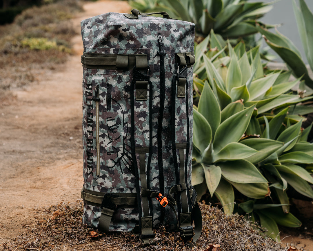 Uncharted Supply Co. x Half Face Blades - The Vault 65L Duffel Bag