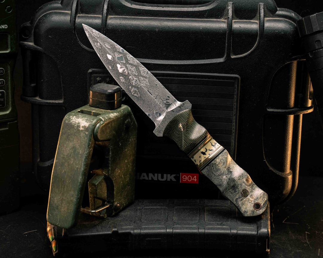 Combat Dagger- OD Green Canvas Micarta, Black G10, Desert Tan G10, OD Green G10 and Copper Pin Striping, Black Calceon Split, Buckeye Burl, Mosaic Pins, Copper Lanyard Pin, Textured Grip