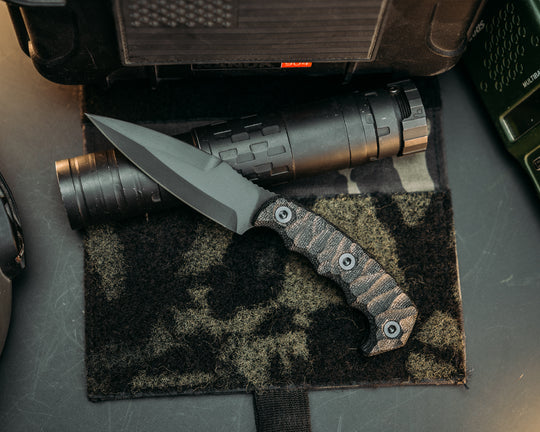 4"  HUMINT- Black Canvas Micarta, Armor Black Cerakote, Allen Bolts, Chaos Grip