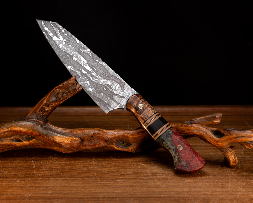 Santoku- Hawaiian Curly Koa, Black G10, Coyote G10 and Copper Pin Striping, Hawaiian Curly Koa Split, Dyed Black Ash Burl, Mosaic Pins, Smooth Grip