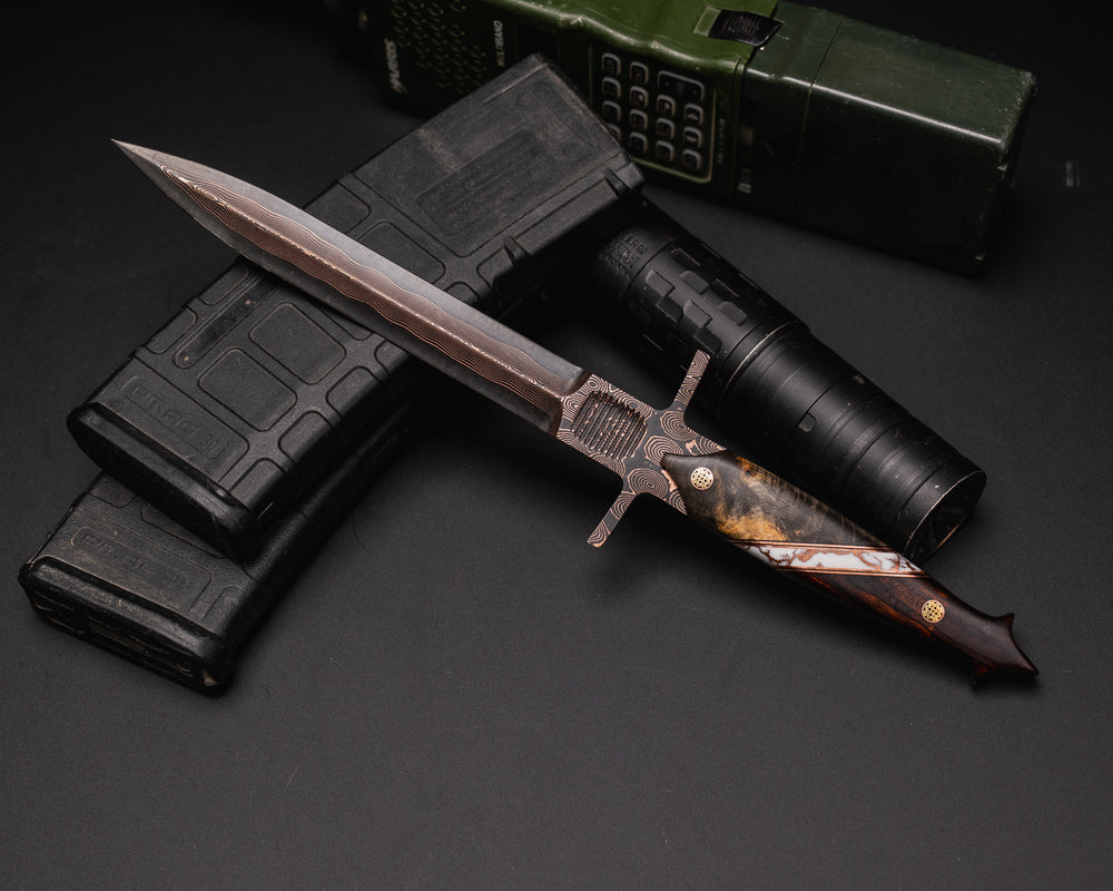 V-42 Dagger- Baker Forge Raindrop CopperMai- Buckeye Burl, Black G10 and Copper Pin Striping, White with Copper Matrix Tru-stone Split, Desert Ironwood, Mosaic Pins, Smooth Grip