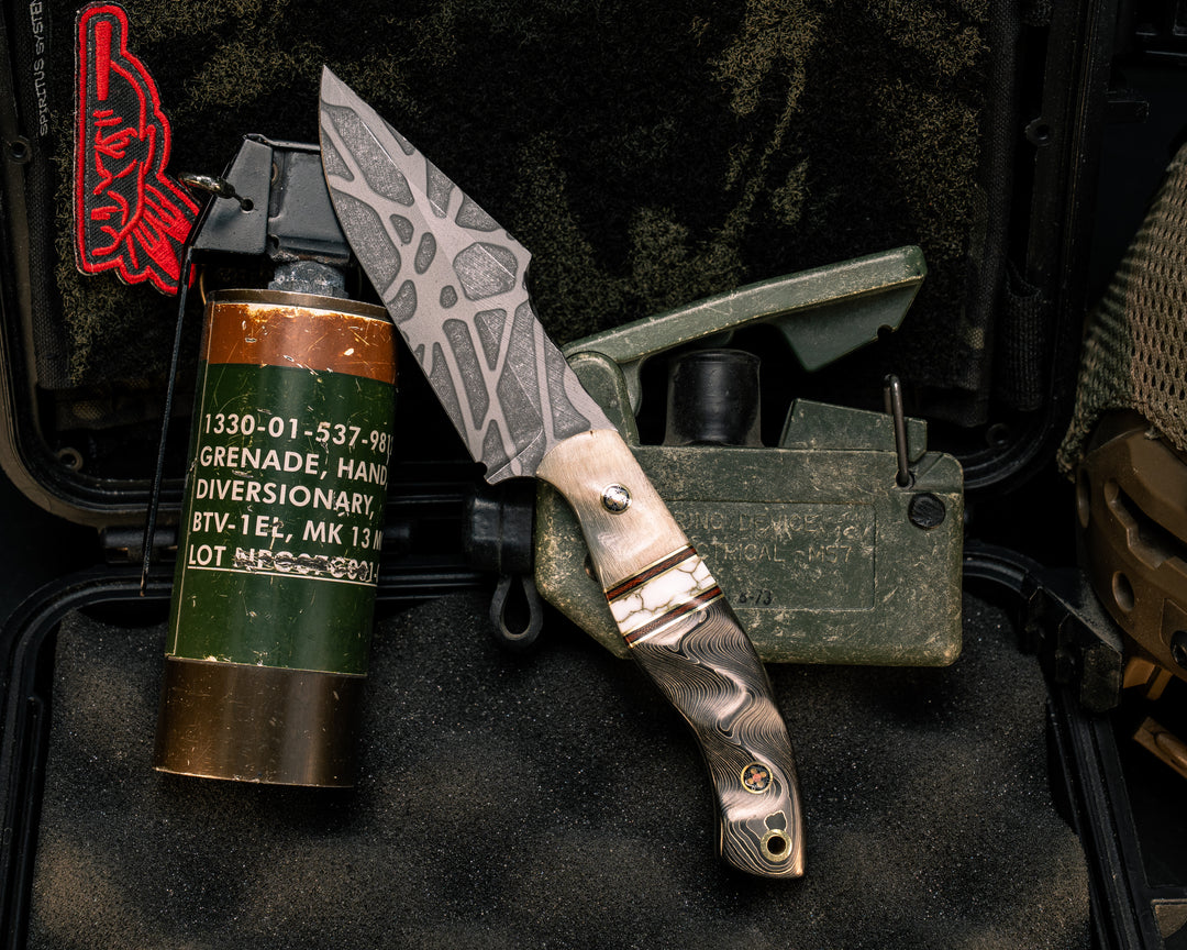 Widow Maker JR- Rams Horn, Brass, Black G10 and Brown Canvas Micarta Pin Striping, White with Gold Web Tru-stone Split, Gold Camo Carbon, Mosaic Pins, Brass Lanyard Pin, Textured Grip