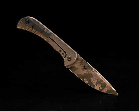 Cav Folder - Black G10, Acid Splash, Textured Grip, TI Frame.