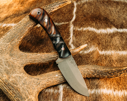 Cavner- Black Burlap Micarta, OD Green G10, Black G10, Aluminum and Copper Pin Striping, Black with Copper Web Tru-stone Split, Desert Ironwood, Copper Pins, Aluminum Lanyard Pin, Grooved Grip