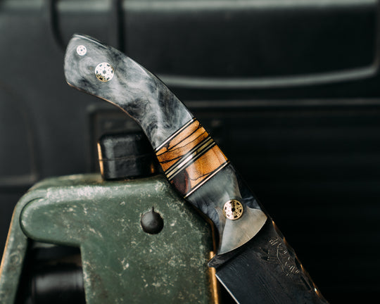 Widow Maker Jr- Baker Forge Random Pattern Damascus- Rams Horn Over Dyed Maple, Black G10 and Brass Pin Striping, Spalted Maple Split, Mosaic Pins, 1/8" Mosaic Pin, Textured Grip