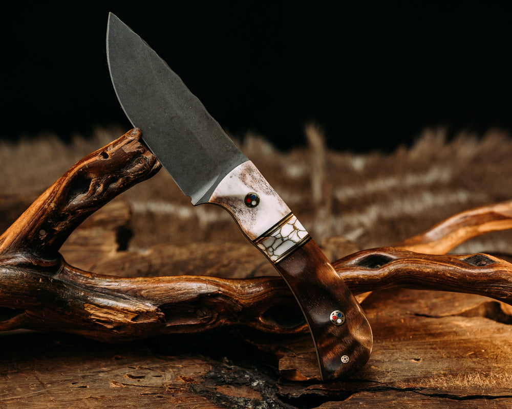 Cav Jr - Elk Antler, Black G10 & Brass Pin Striping, White w/ Gold Web Tru Stone Split, Hawaiian Curly Koa, Brass Patriot Pins, Textured Grip.