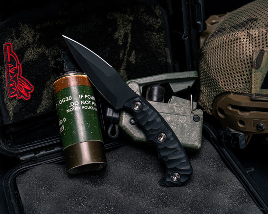 4"  HUMINT- Black G10, Armor Black Cerakote, Ti Allen Bolts, Textured Grip