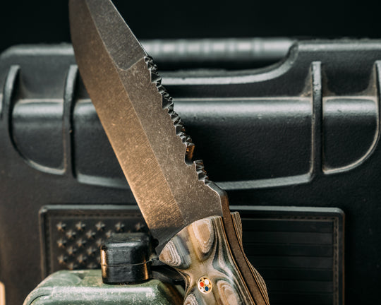Notched Disaster Breacher- Layered Navy S.E.AL AOR1 and AOR2 Cammie Micarta, Tan and Black G10 Liner, Patriot Mosaic Pins, Brass Lanyard Pin, Textured Grip