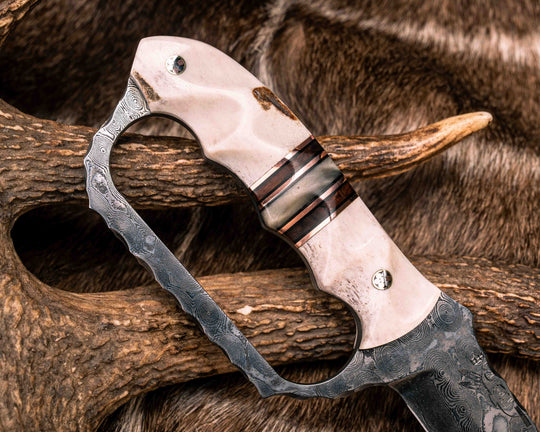 Trench Knife- Baker Forge Raindrop Damascus- Elk Antler, Black G10 and Copper Pin Striping, Desert Ironwood and Rams Horn Split, Mosaic Pins, Textured Grip