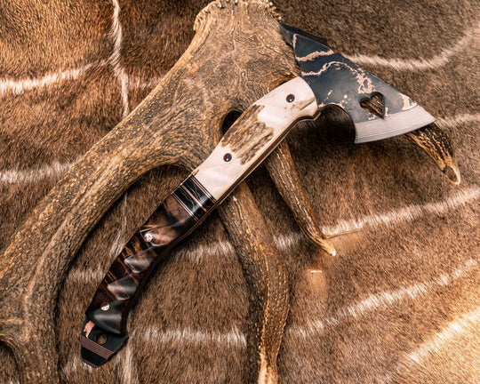 Bleeding Heart Hawk- Baker Forge Random Pattern CopperMai- Elk Antler, Black G10 and Copper Pin Striping, Raffir Noble Curly Copper Split, Hawaiian Curly Koa Copper Patriot Mosaic Pins, Textured Grip