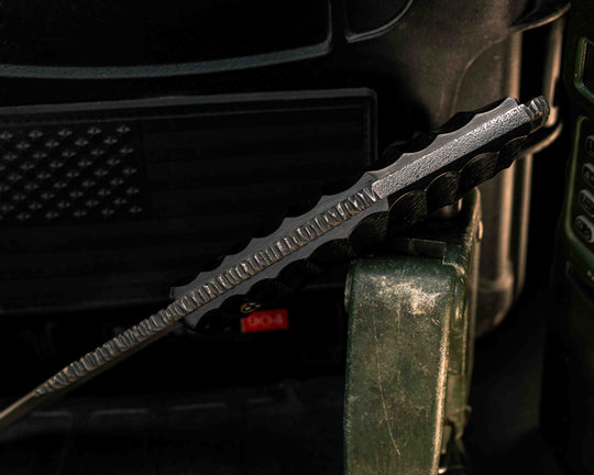The Sabot- 2x2 Twill Carbon, Glow Mosaic Pin, Hidden Pin in Tang, Compound Grind, Textured Grip