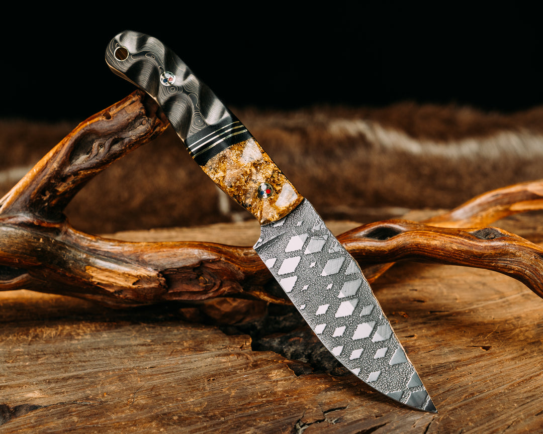 Crow Scalper- Gold Flakes in resin, Black Canvas Micarta & Brass Split, Gold Camo Carbon, Patriot Mosaic Pins, Brass Lanyard Pin.