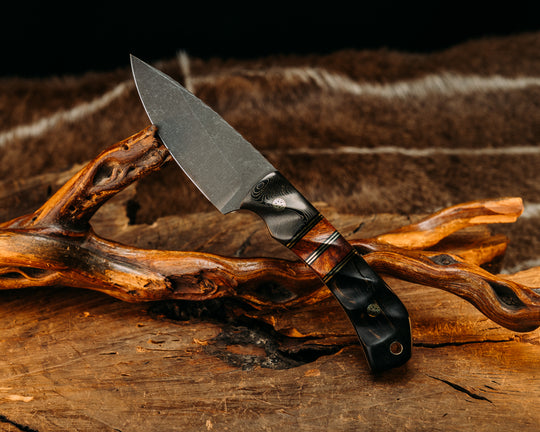 Modified Cavner- Gold Camo Carbon, Black G10 & Brass Pin Striping, Texas Mesquite split, Black and white ebony Mosaic Pins, Brass Lanyard Pin, Textured Grip.