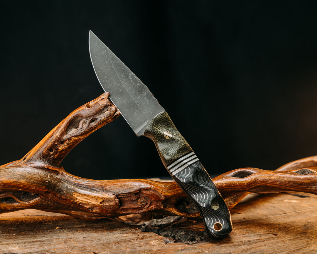 Feather Light- OD Green Canvas Micarta, Black G10, White G10 and Brass Split, Silver Dragon Strike Carbon, Brass Mosaic Pins, Brass Lanyard Pin, Textured Grip