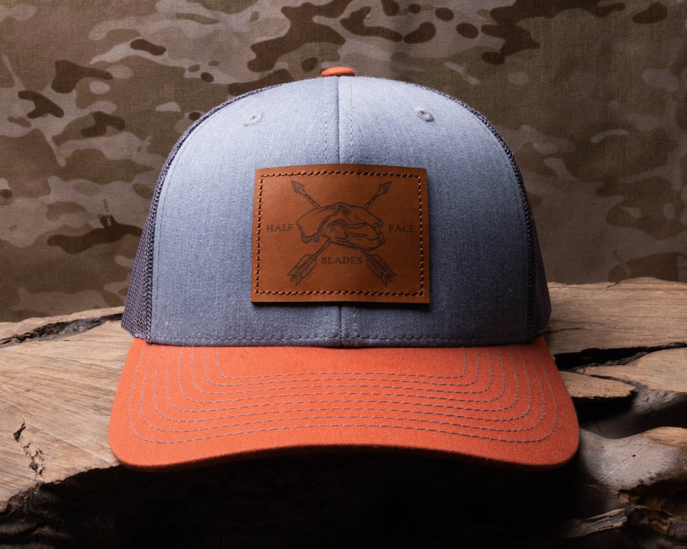 Half Face Blades Bear Skull Leather Patch Trucker Hat