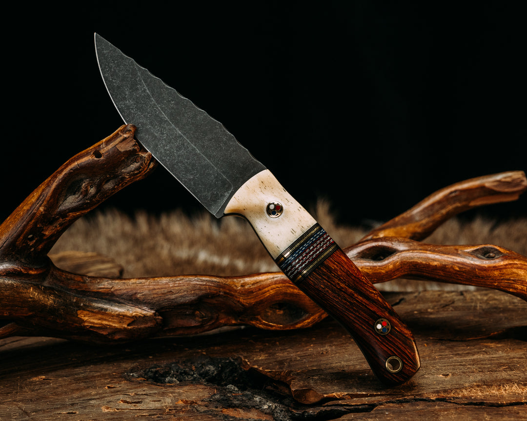 Warbird, Feather Light, Skinner Jr. Set- Giraffe Bone, Black G10 and Brass Pin Striping, Red, White and Blue Canvas Micarta Split, Brass Patriot Pins, Brass Lanyard Pin (Feather Light Only), Textured Grip