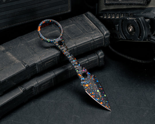 Ringstrike- 80's Rad Splatter Cerakote and Machined Rockwork Handle