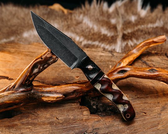 Crow Jr (Compound Grind)- Black Burlap Micarta, Black G10 and Copper Pin Striping, Black Burlap Micarta Split, Snakewood Over Buckeye Burl, Mosaic Pins, Copper Lanyard Pin, Textured Grip