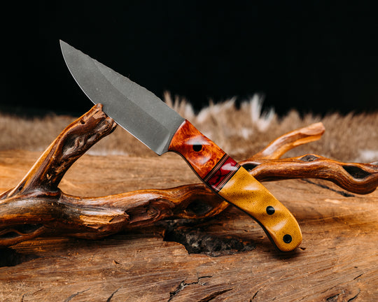 Crow Jr- Afzelia Burl, Black G10, Coyote G10, Cherry G10 and White G10 Pin Striping, Bloody Basin Tru-stone Split, Vintage Butterscotch Canvas Micarta, CF Pins, CF Lanyard Pin, Textured Grip