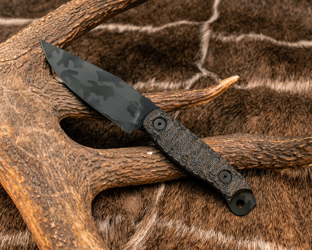Crow Scalper- Black Canvas Micarta, Black Multicam Cerakote, Allen Bolts, Textured Grip
