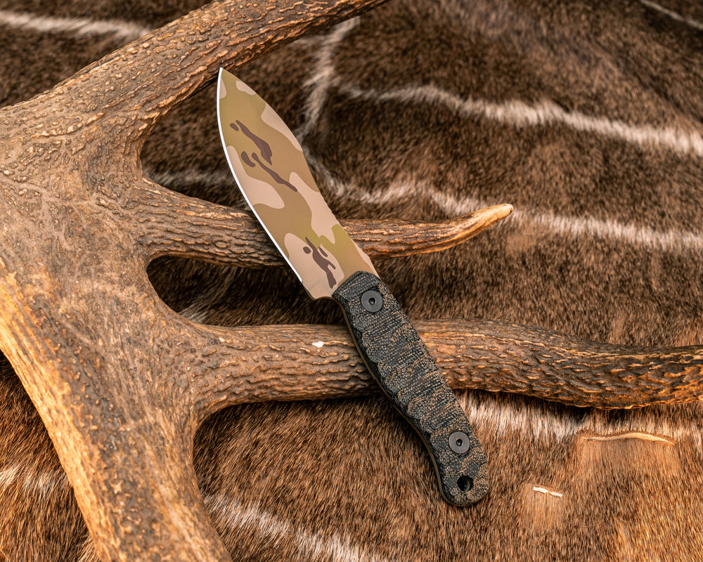 Skinner Jr - Black Canvas Micarta, Arid Multicam Cerakote, Allen Bolts, Textured Grip