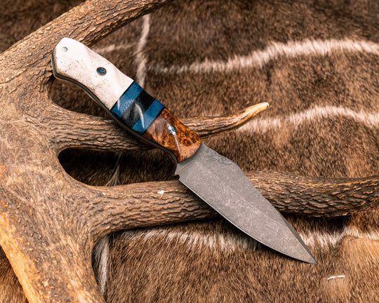 Field Knife- Amboyna Burl, Black G10, Admiral Blue Jute Micarta and Black Canvas Micarta Split, CO Elk Antler, Mosaic Pins, 1/8" Aluminum Pin, Textured Grip