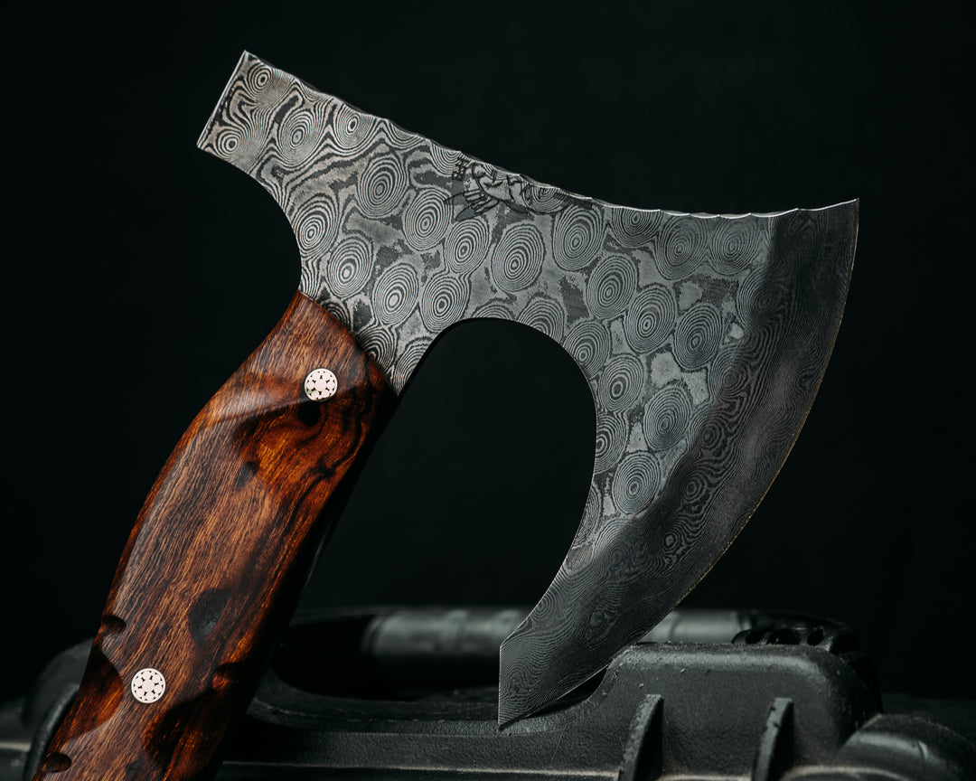 Viking Operator Hawk- Baker Forge Raindrop Damascus- Desert Ironwood, Black G10 and Brass Pin Striping, American Flag Micarta and AOR2 Cammie Micarta Split, Black Diamond Richlite, Mosaic Pins, Textured Grip