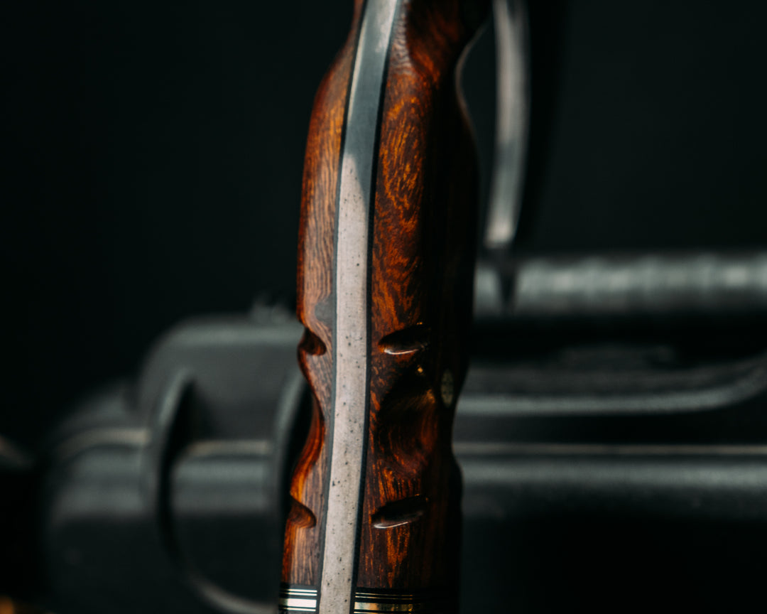 Viking Operator Hawk- Baker Forge Raindrop Damascus- Desert Ironwood, Black G10 and Brass Pin Striping, American Flag Micarta and AOR2 Cammie Micarta Split, Black Diamond Richlite, Mosaic Pins, Textured Grip
